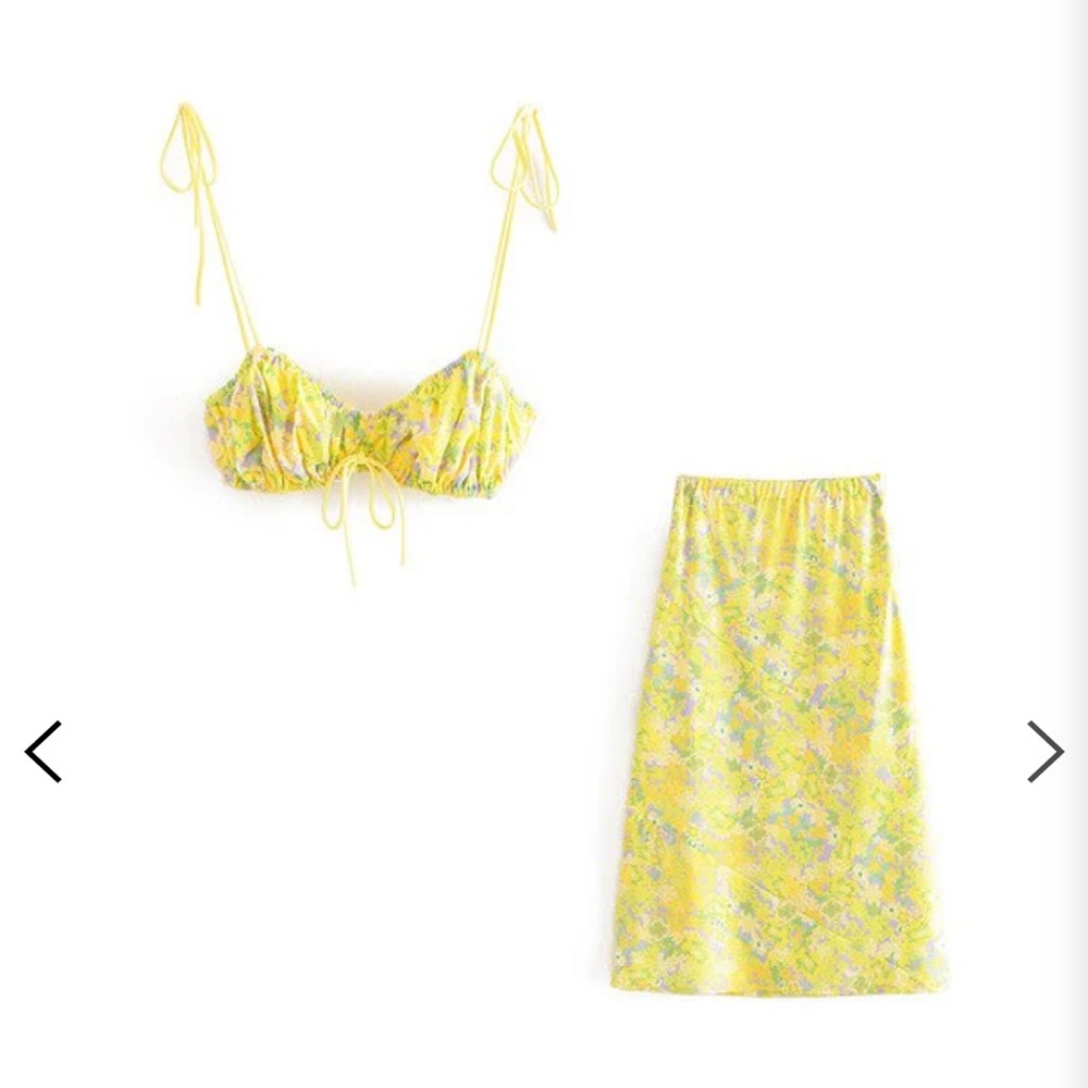 Top fits S but says large. Medium skirt is S/M
